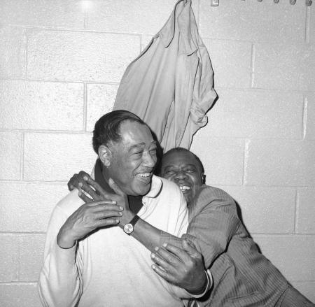 Duke Ellington (left) and Louis Armstrong in dressing room at New York's Madison Square Garden on Feb, 23, 1970, for a musical tribute sponsored by the NAACP. © Ed Ford